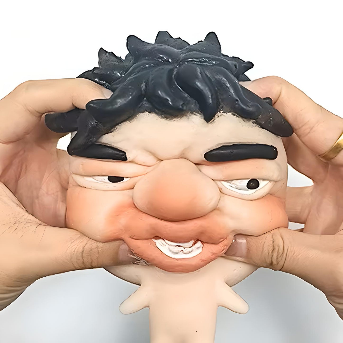 Close-up squish of refillable pimple popper toy squishy face, soft silicone-style sensory fidget