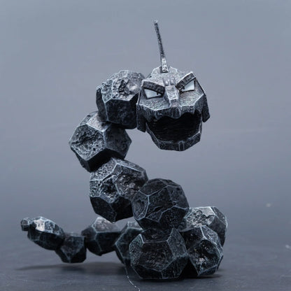 Onix-inspired rock serpent toothbrush holder figurine in black, desktop product photo