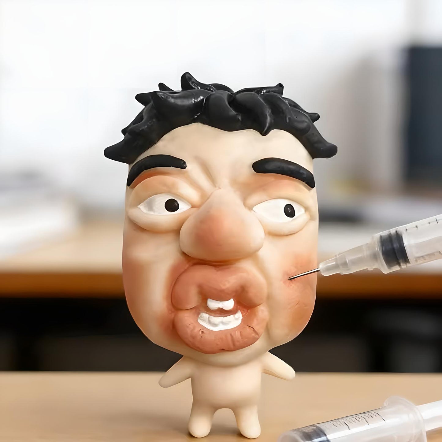 Refillable pimple popper toy being injected with filler using syringe, pimple popping fidget toy demo